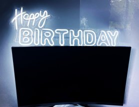 Happy BIRTHDAY logo - LED neon sign on the wall hanging