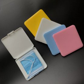 Plastic box for storing protective masks with a grip for mask