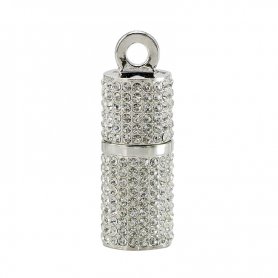 The silver USB jewel key ornate with white rhinestones