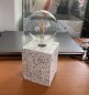 Night lamp - LED light bulb on a stone base (platform)